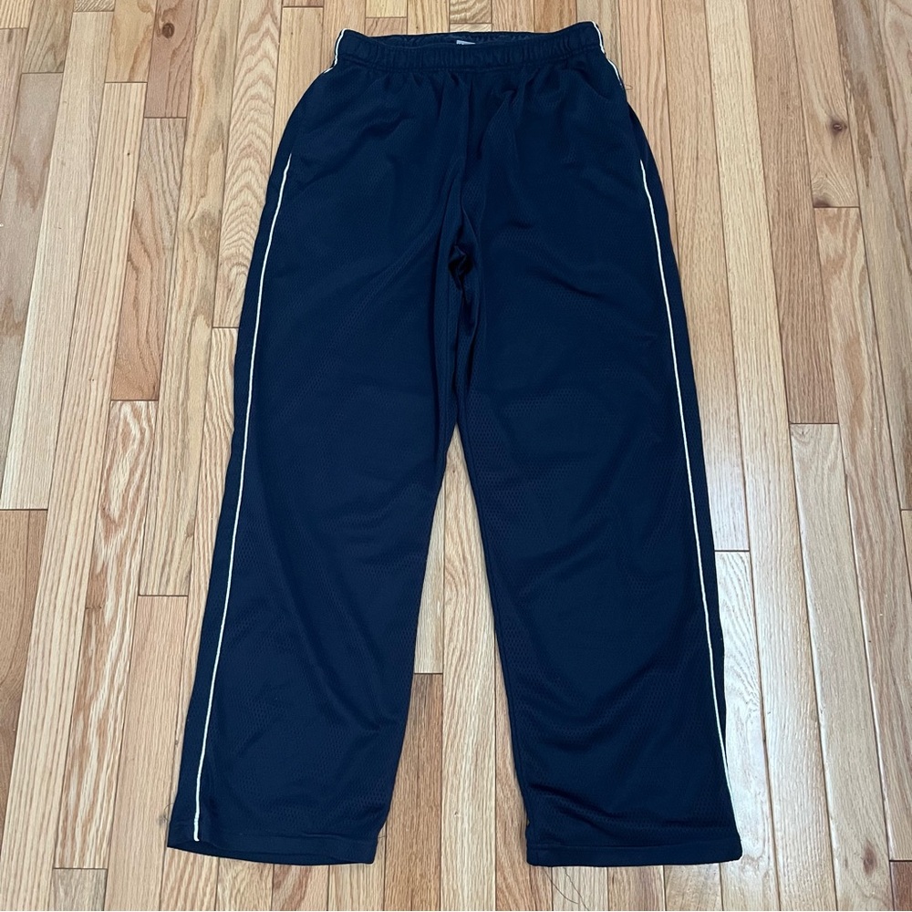 Pro Spirit track pants with white stripes down the sides. Vintage! Size M